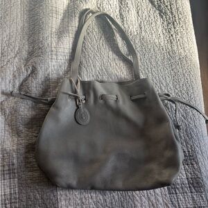 Roots tote and purse.  Grey Pebbled crossbody purse and Leather Drawstring Tote